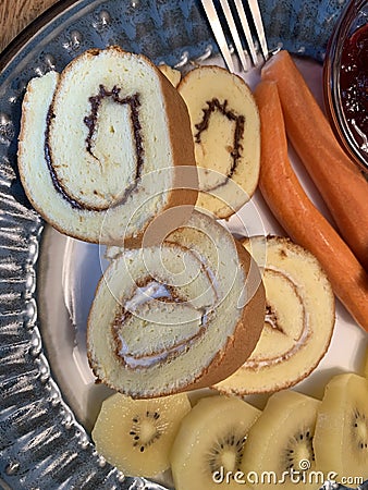 Healthy breakfast, roll cakes, kiwi fruit, radish Stock Photo