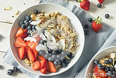 Healthy Fresh Oatmeal with Strawberries Stock Photo