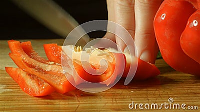 Healthy fresh red Capsicum pepper food prep cutting up in kitchen stock video footage Healthy fresh red Capsicum pepper food prep cutting up in kitchen stock video footage
