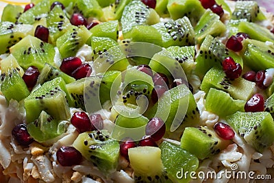 Healthy fruit salad kiwi and pomegranate background Stock Photo