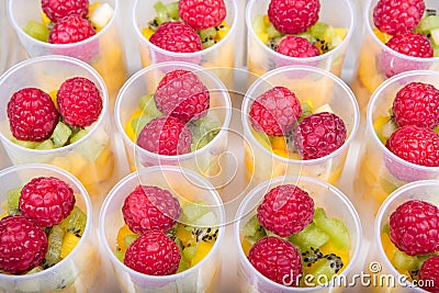 Fruit salad in push up cake forms Stock Photo