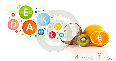 Healthy fruits with colorful vitamin symbols and icons Stock Photo