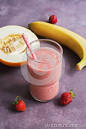 Healthy fruity berry smoothie, strawberry, banana and melon. Selective focus. Dietary drink Stock Photo