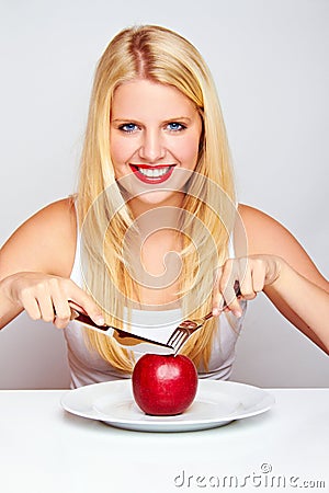 Healthy Girl eating an red apple Stock Photo