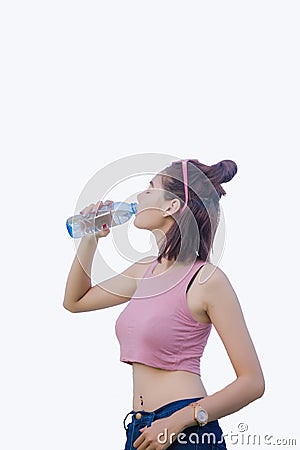 Healthy girl`s drinking water in the bottle , drink for thirstily for Refreshing Stock Photo