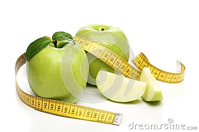 Healthy green apple and a measuring tape Stock Photo