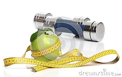 Healthy green apple and a measuring tape Stock Photo