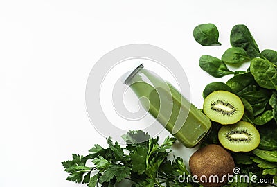 Healthy green smoothie or juice and ingredients on white - superfoods, detox, diet, health, vegetarian food concept. Copy space Stock Photo