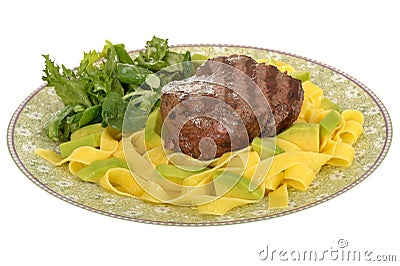 Healthy Grilled Fillet Steak with Pasta and Green Salad Meal Stock Photo