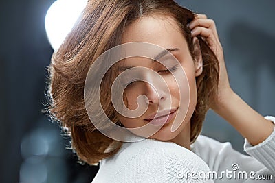 Healthy Hair. Beautiful Woman With Short Brown Hair Stock Photo