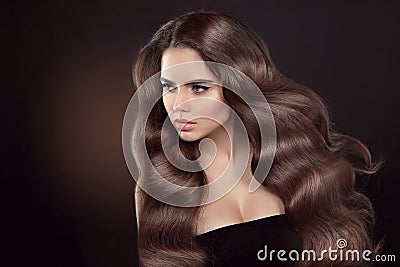 Healthy hair. Wavy hairstyle. Beautiful brunette woman model wit Stock Photo