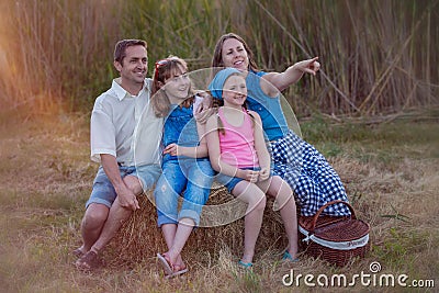 Healthy happy family outdoors in summer picnic Stock Photo