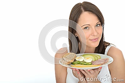 Healthy Happy Natural Young Woman Holding a Plate of Norwegian Style Breakfast Stock Photo