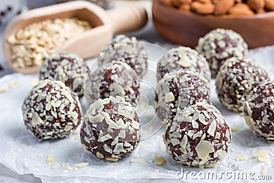 Healthy homemade paleo chocolate energy balls on parchment, horizontal Stock Photo