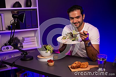 Healthy influencer in host channel taste chicken meat. Surmise. Stock Photo