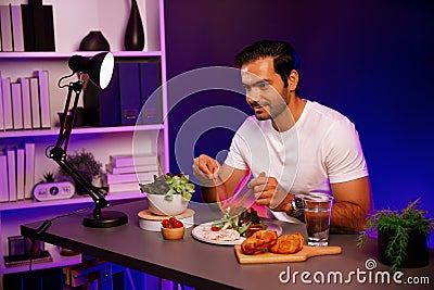Healthy influencer in host channel taste chicken meat. Surmise. Stock Photo