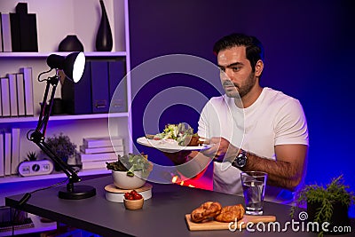 Healthy influencer in host channel taste chicken meat. Surmise. Stock Photo