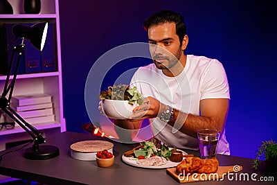 Healthy influencer presenting cold fresh vegetables on diet life. Surmise. Stock Photo