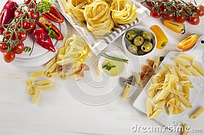 Healthy Italian food ingredients on a whiete wooden background. Stock Photo