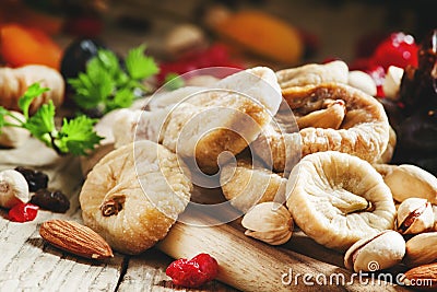 Healthy lean food: set of dried fruit with figs, dates, cherries Stock Photo