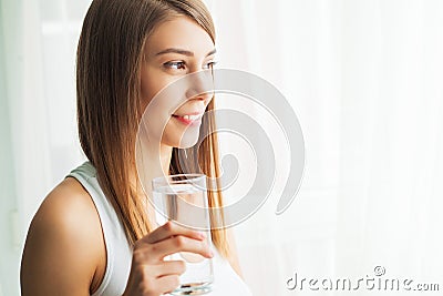 Healthy Lifestyle. Close-up Portrait Of Young Woman Drinking Refreshing Pure Water From Glass. Healthcare. Drinks. Water Stock Photo