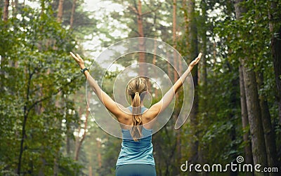 Healthy lifestyle fitness sporty woman early in forest area Stock Photo