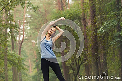 Healthy lifestyle fitness sporty woman stretching before run in Stock Photo