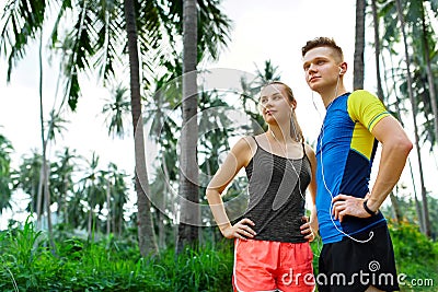 Healthy Lifestyle. Runner Couple Preparing To Jog. Fitness And S Stock Photo