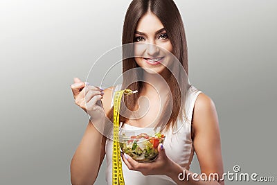 Healthy Lifestyle. A woman eats a salad. Young woman eating heal Stock Photo