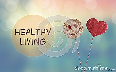 Healthy living with heart and smile emoji Stock Photo