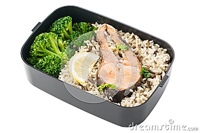 Healthy lunch box with brown rice, broccoli and salmon. Stock Photo