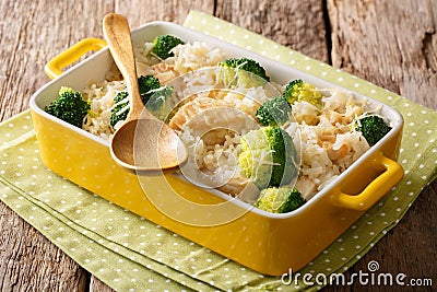 Healthy lunch: rice with broccoli, chicken, garlic and cheese cl Stock Photo