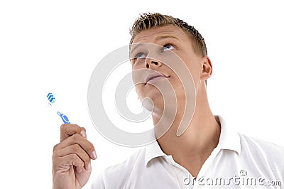 Healthy male posing with toothbrush Stock Photo