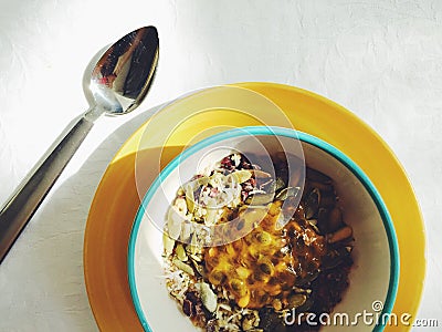 Healthy Mexican breakfast: puffed amaranth, pumpkin seeds, coconut, cacao, passionfruit Stock Photo