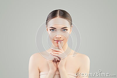 Healthy model woman with clear skin portrait. Spa, wellness, cosmetology and facial treatment Stock Photo