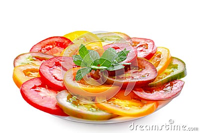 Healthy natural food colorful Tomato Slices and green mint, Fre Stock Photo