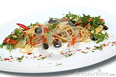 Healthy noodles with mushrooms and vegetables close-up on a plate Stock Photo