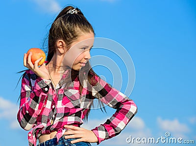 Healthy nutrition concept. Child eat ripe apple fall harvest. Fruit vitamin nutrition for kids. Apple fruit diet. Kid Stock Photo