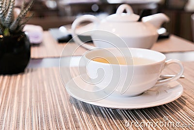 Green herbal tea in a restaurant, five o\'clock Stock Photo