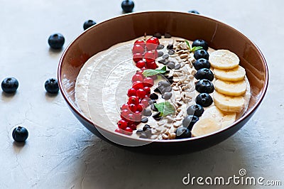 Healthy oat smoothie with bananas and cottage cheese garnished w Stock Photo