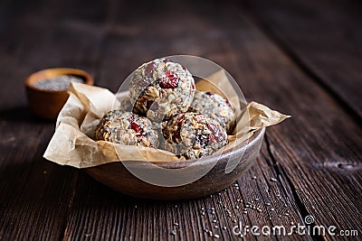 Healthy oatmeal balls with chia seeds, cranberries, coconut, flax seeds and honey Stock Photo