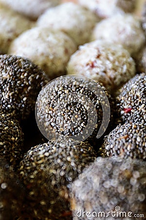 Healthy oats balls with chia seeds and coconut toppings. Stock Photo