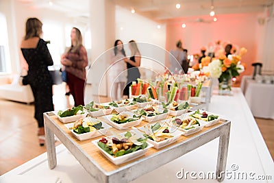 Healthy organic gluten-free delicious green snacks salads on catering table during corporate event partyÑŽ Stock Photo