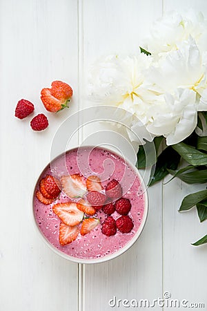 Healthy Pink Smoothie in the Bowl from Banana and Strawberries w Stock Photo