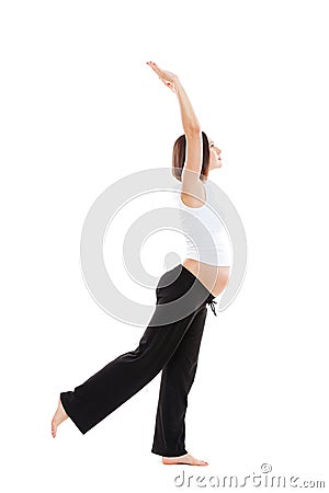Healthy pregnant woman doing gymnastic Stock Photo