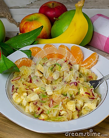 Healthy rasped fruit salad with apples Stock Photo