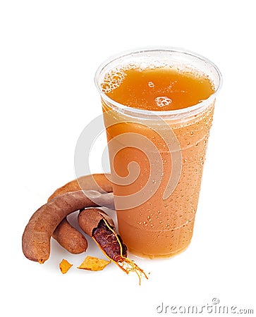 Cold and refreshing tamarind drink on a white background Stock Photo