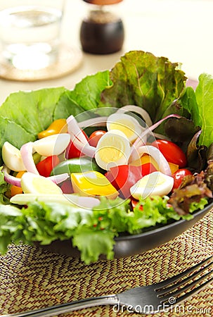 Healthy salad with quail eggs Stock Photo