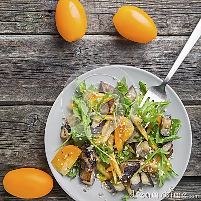 Healthy salad of vegetables - tomatoes, arugula, eggplant Stock Photo