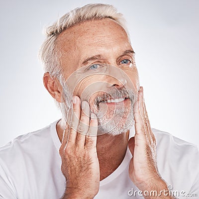 Healthy skincare, mature man and touching face on studio background. Mature guy, clean beard or facial cosmetics of male Stock Photo